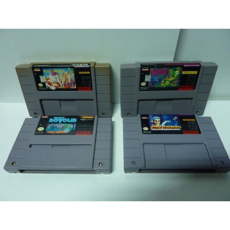LOT DE 4 JEUX SUPER NES : REX RONAN, CAPTAIN NOVOLIN, BRONKIE, PACKY & MARLON
